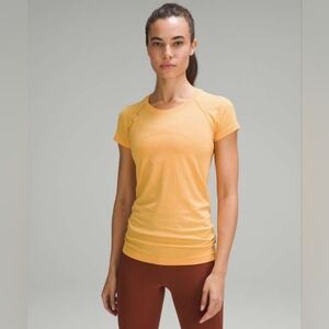 Lululemon athletica Short-Sleeve Performance Tee in Mango Dream Size 8